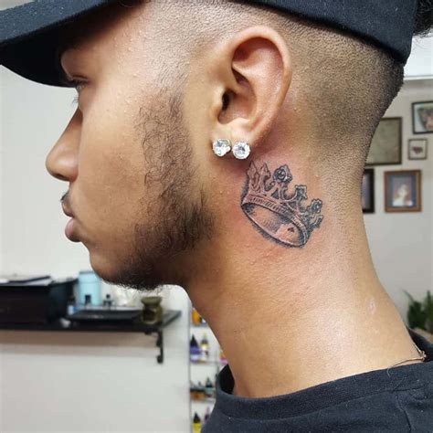 crown tattoo back of neck.